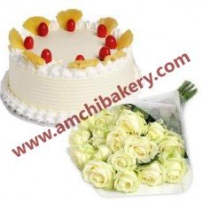 Pineapple cake with white flowers bunch