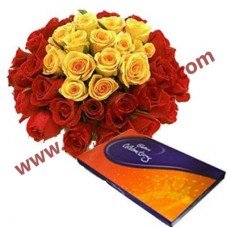 White and yellow fresh flower with cad-bury celebration pack